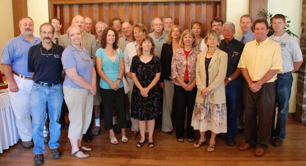 The D&L's Sherry Acevedo (center) stands with the 2009 LVGI block grant recipients.